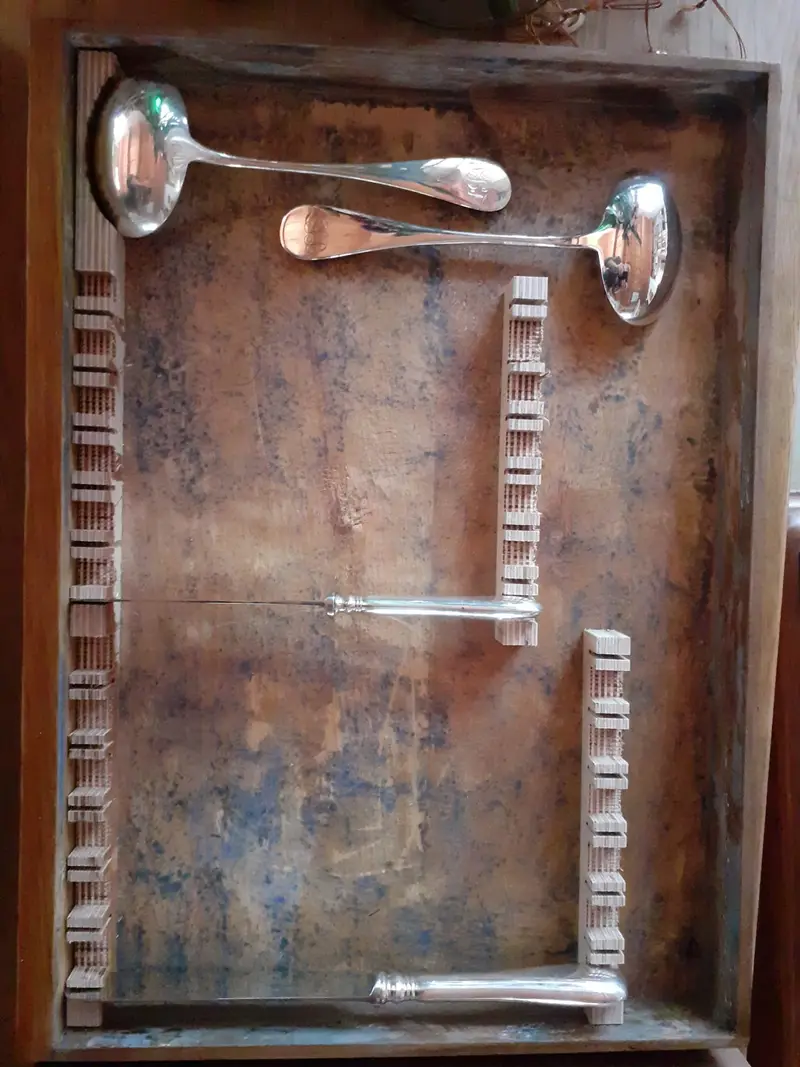 New interior for the drawers of a canteen, before
